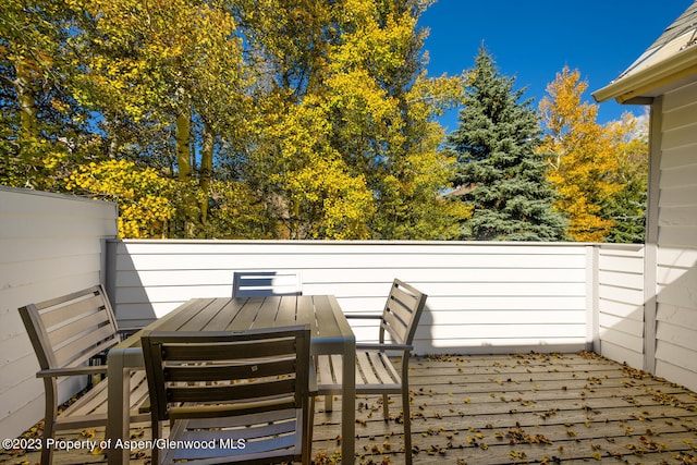 1195 E Cooper Ave Unit A, Aspen, CO 81611 - wooden deck featuring outdoor dining area