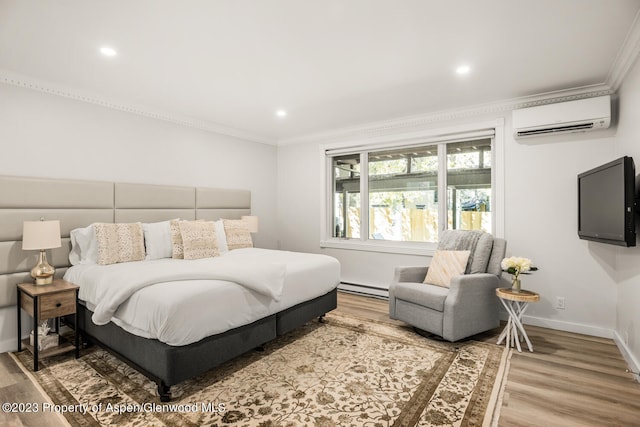 1195 E Cooper Ave Unit A, Aspen, CO 81611 - bedroom featuring a wall unit AC, a baseboard radiator, crown molding, wood finished floors, and recessed lighting