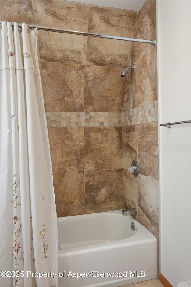 full bath with shower / bathtub combination with curtain