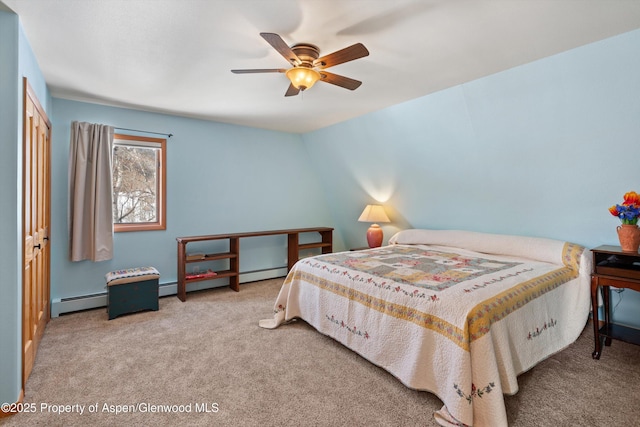 bedroom with a baseboard heating unit, a baseboard radiator, carpet flooring, and a ceiling fan