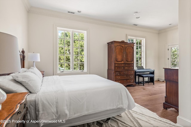 2959 County Road 103, Carbondale, CO 81623 - bedroom featuring ornamental molding and wood finished floors