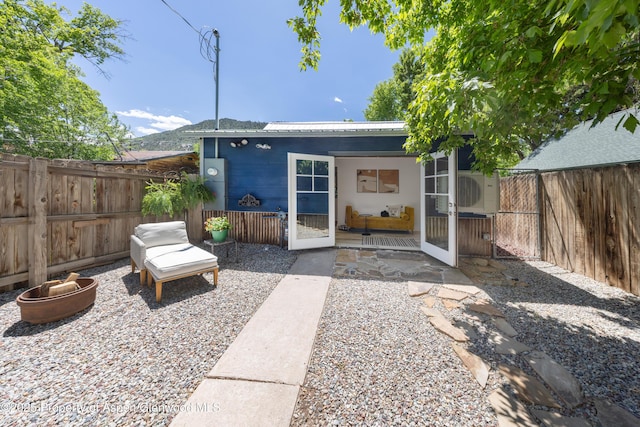 742 W Main St, New Castle, CO 81647 - back of property with a fenced backyard and a cooling unit