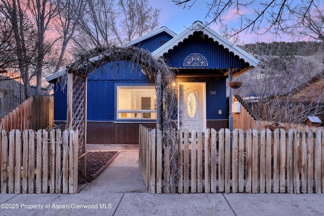 742 W Main St, New Castle, CO 81647 - view of front of house with a fenced front yard