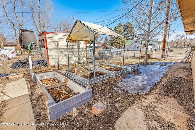 view of yard with a garden and fence