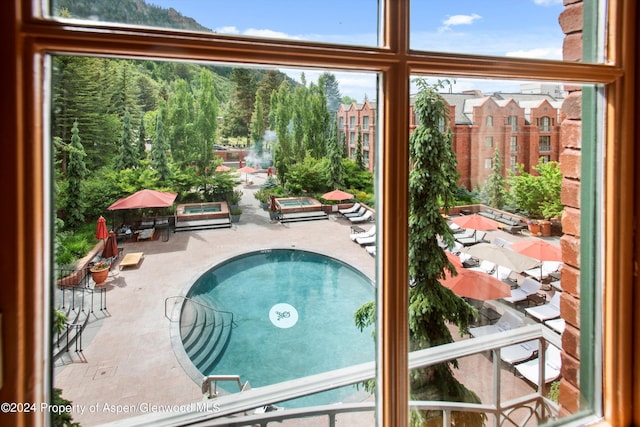 view of pool featuring a patio