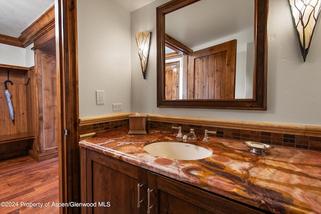 bathroom featuring hardwood / wood-style floors and vanity