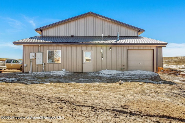 TBD Pronghorn Rd, Craig, CO 81625 - view of front facade with a metal roof, a detached garage, and board and batten siding