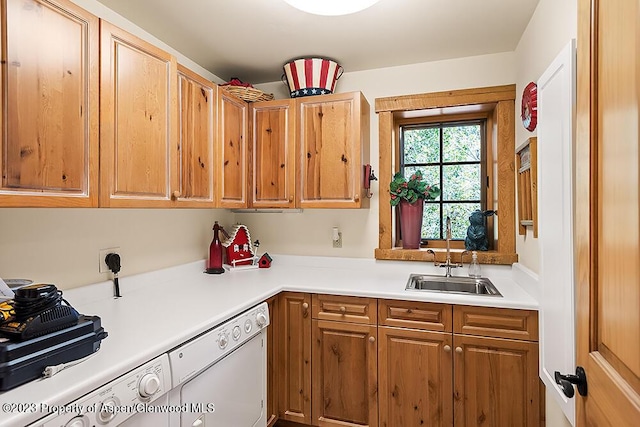 kitchen featuring dishwasher and sink