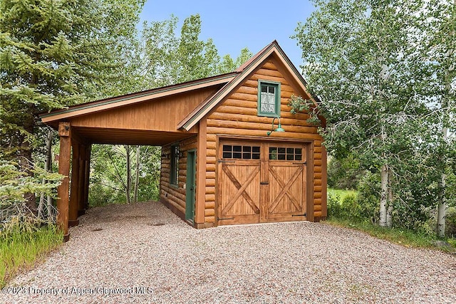 view of outdoor structure with a garage