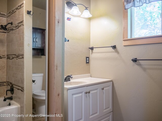 783 Orchard Rd, Montrose, CO 81401 - full bath featuring vanity, toilet, and bathing tub / shower combination