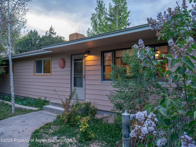 783 Orchard Rd, Montrose, CO 81401 - view of side of property featuring a chimney