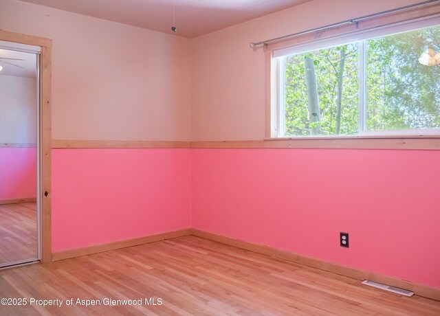 783 Orchard Rd, Montrose, CO 81401 - empty room with wood finished floors and baseboards