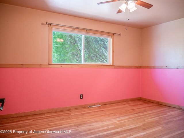 783 Orchard Rd, Montrose, CO 81401 - unfurnished room featuring wood finished floors and a ceiling fan