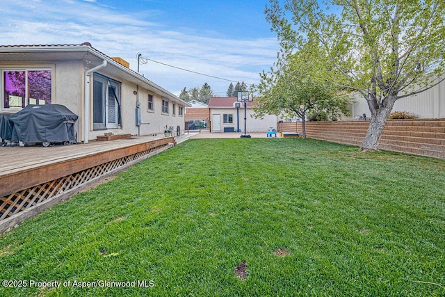 301 W 10th St, Craig, CO 81625 - view of yard with a wooden deck