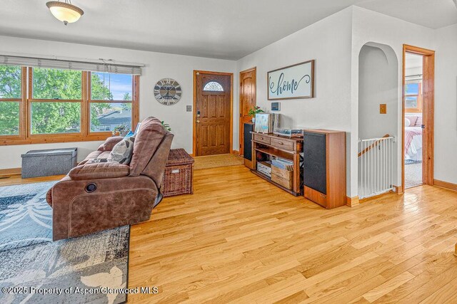 301 W 10th St, Craig, CO 81625 - living area with light wood-style flooring and baseboards