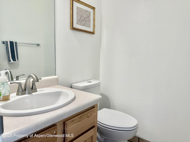 289 Mikala Ln, New Castle, CO 81647 - half bathroom with toilet and vanity