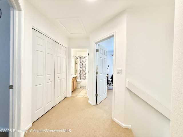 289 Mikala Ln, New Castle, CO 81647 - hallway with light carpet and attic access