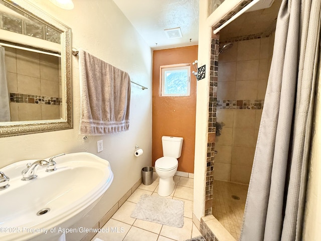 289 Mikala Ln, New Castle, CO 81647 - bathroom with tile patterned flooring and a stall shower