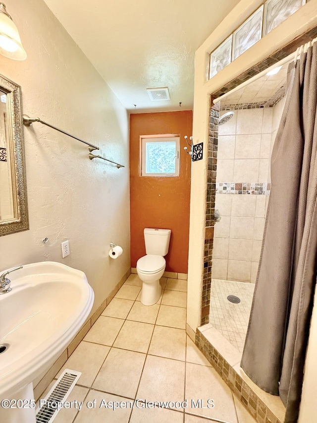 289 Mikala Ln, New Castle, CO 81647 - bathroom featuring a shower stall and tile patterned floors