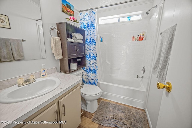 full bathroom featuring shower / tub combo, toilet, and vanity