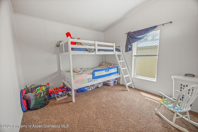 carpeted bedroom featuring crown molding