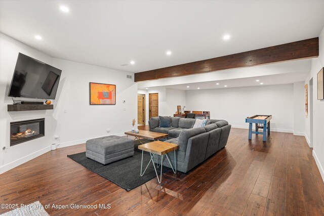 1108 County Road 110, Glenwood Springs, CO 81601 - living room with recessed lighting, dark wood-style floors, baseboards, beam ceiling, and a glass covered fireplace