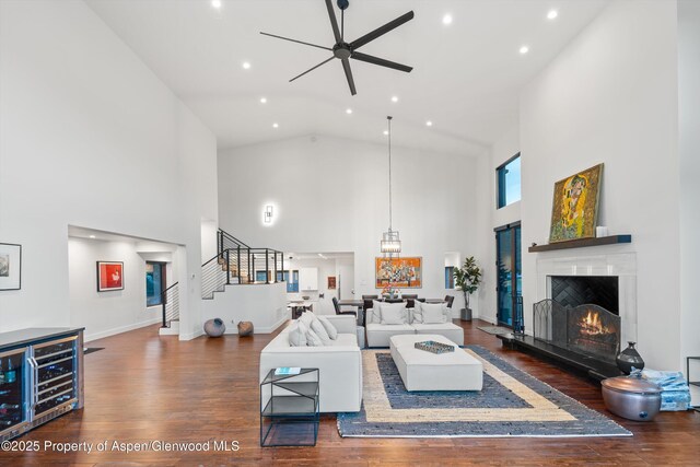 1108 County Road 110, Glenwood Springs, CO 81601 - living room featuring a ceiling fan, wine cooler, high vaulted ceiling, wood finished floors, and recessed lighting