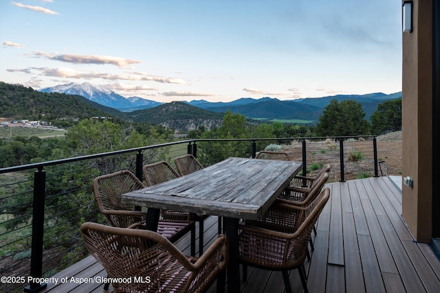 1108 County Road 110, Glenwood Springs, CO 81601 - wooden terrace with a mountain view and outdoor dining space