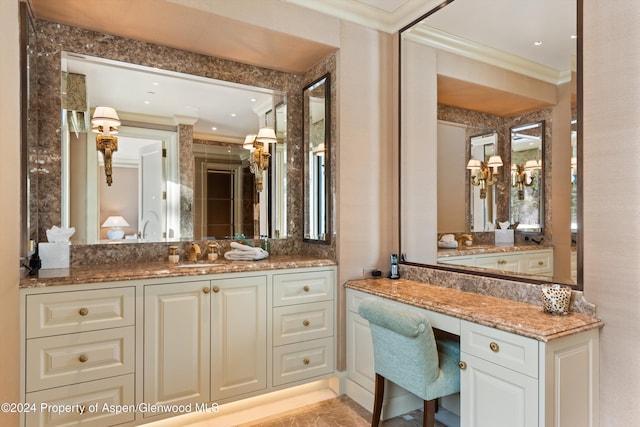 bathroom with vanity and crown molding