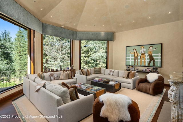 64 Pitkin Way, Aspen, CO 81611 - living area featuring wood finished floors, recessed lighting, and a towering ceiling