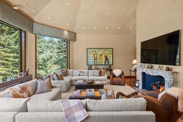 64 Pitkin Way, Aspen, CO 81611 - living area featuring high vaulted ceiling, recessed lighting, and a high end fireplace