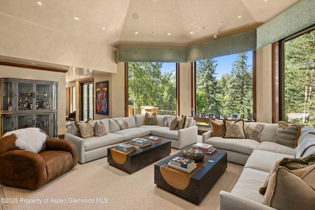 64 Pitkin Way, Aspen, CO 81611 - living room with a towering ceiling, recessed lighting, and healthy amount of natural light