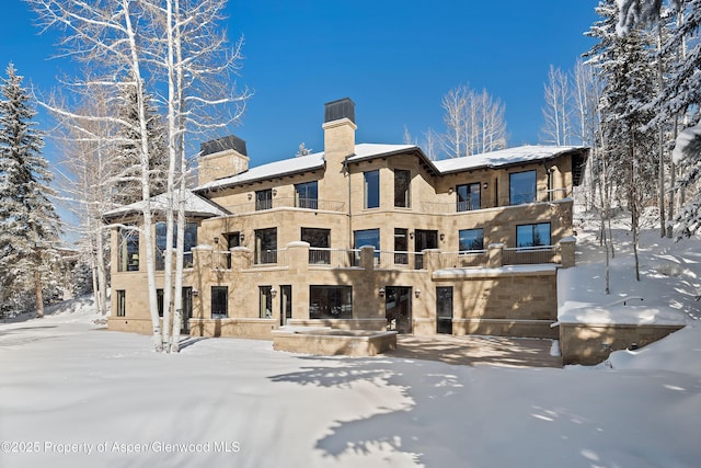 view of snow covered property