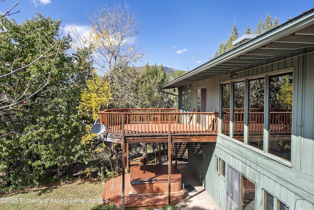 172 Sunny Acres Rd, Glenwood Springs, CO 81601 - wooden deck featuring a covered hot tub