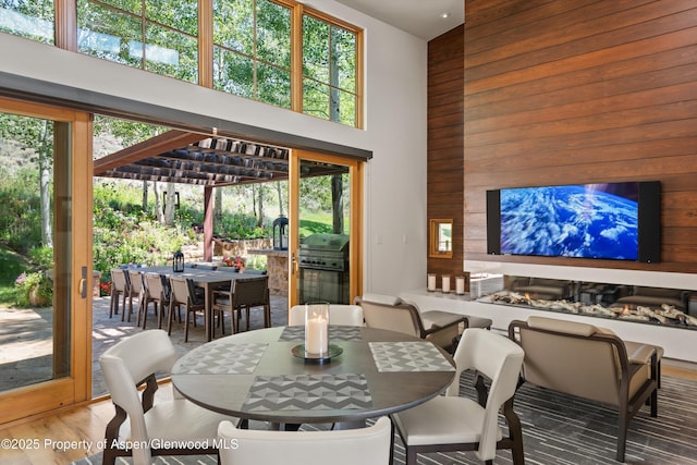 1000 Lazy O Rd, Snowmass, CO 81654 - dining space featuring wooden walls and a towering ceiling