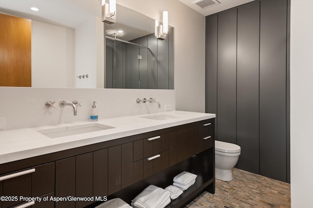 1000 Lazy O Rd, Snowmass, CO 81654 - full bath with a sink, brick floor, toilet, and double vanity