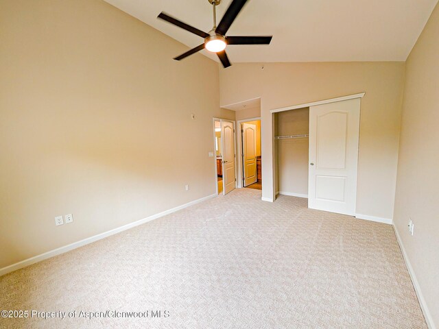612 Riverview Dr Unit 808, New Castle, CO 81647 - unfurnished bedroom with light carpet, a closet, high vaulted ceiling, and baseboards