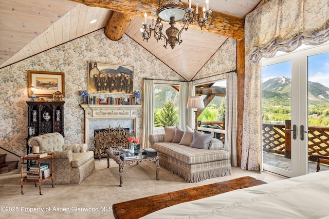 87 Magnifico Dr, Aspen, CO 81611 - carpeted living room featuring a chandelier, plenty of natural light, wooden ceiling, french doors, and a high end fireplace