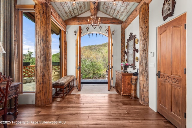 87 Magnifico Dr, Aspen, CO 81611 - entrance foyer with hardwood / wood-style flooring and a chandelier