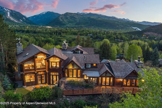87 Magnifico Dr, Aspen, CO 81611 - mountain view with a heavily wooded area