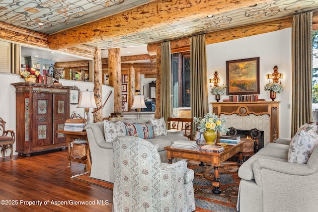 87 Magnifico Dr, Aspen, CO 81611 - living area with wood-type flooring and a brick fireplace