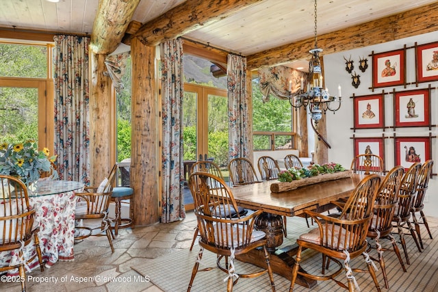 87 Magnifico Dr, Aspen, CO 81611 - dining space with a wood ceiling with exposed beams, a chandelier, french doors, and stone tile flooring