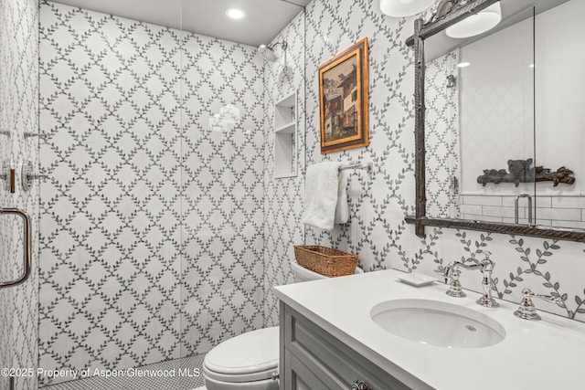 87 Magnifico Dr, Aspen, CO 81611 - bathroom featuring vanity, a shower with door, recessed lighting, and wallpapered walls