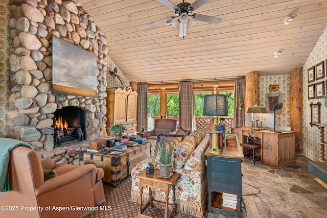 87 Magnifico Dr, Aspen, CO 81611 - living room with wood ceiling, a ceiling fan, a fireplace, and stone finish flooring