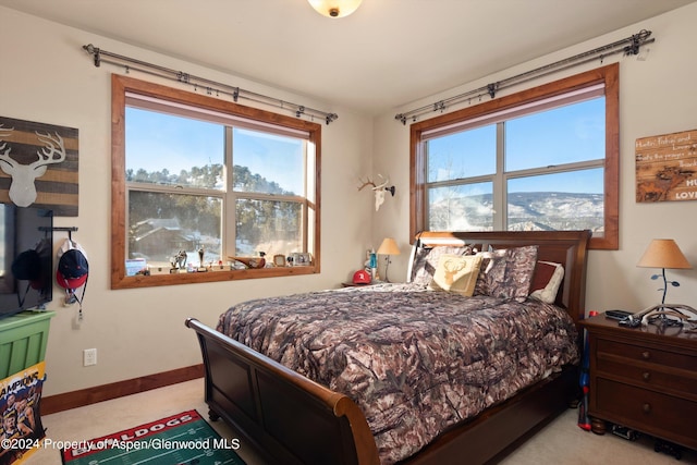 bedroom with a mountain view