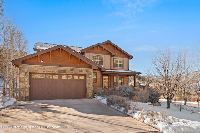 view of front of property with a garage