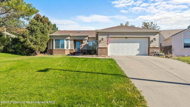 view of front of home featuring driveway, a garage, a front lawn, and brick siding