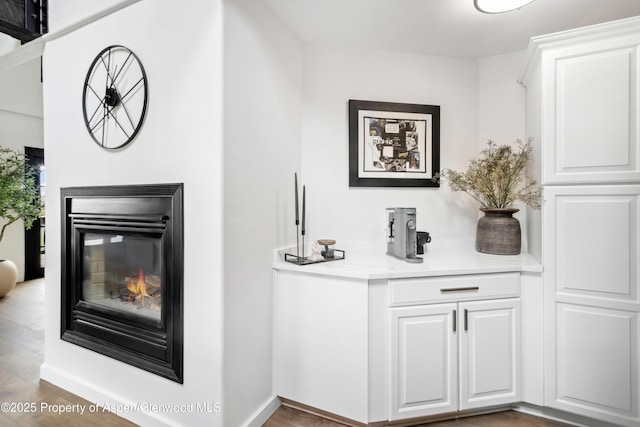 detailed view of a glass covered fireplace