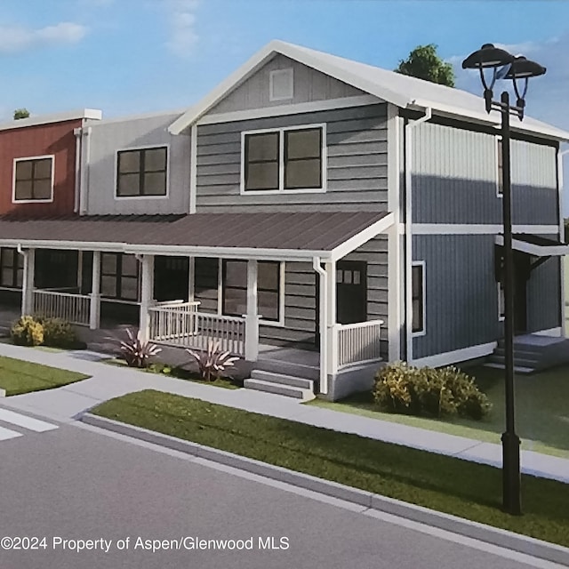 754 Tucker St, Craig, CO 81625 - townhome / multi-family property with covered porch