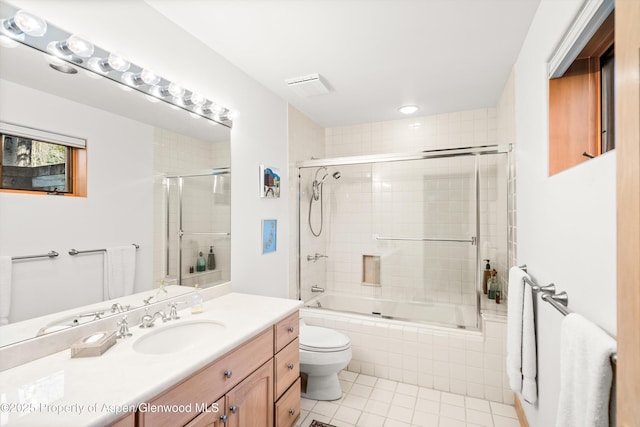333 W Hopkins Ave, Aspen, CO 81611 - full bathroom featuring toilet, visible vents, tile patterned flooring, vanity, and tiled shower / bath